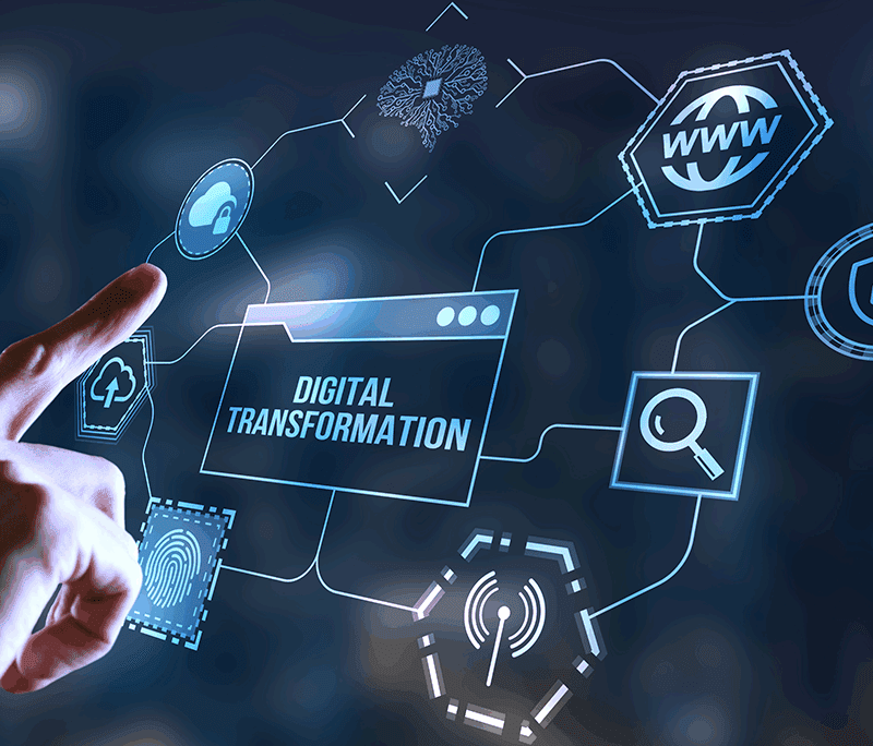 A hand points at a virtual interface displaying the words "Digital Transformation" surrounded by various technology icons.