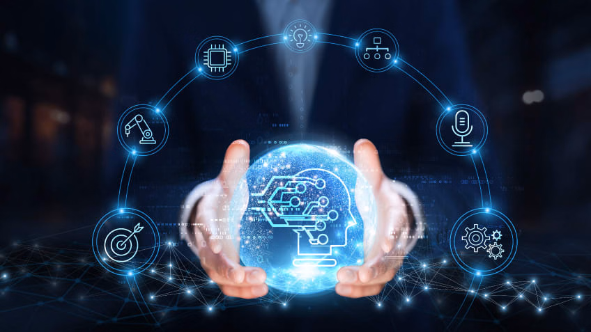 A person holds a glowing digital globe displaying a circuit brain icon, surrounded by technology and artificial intelligence symbols connected in a semicircle.