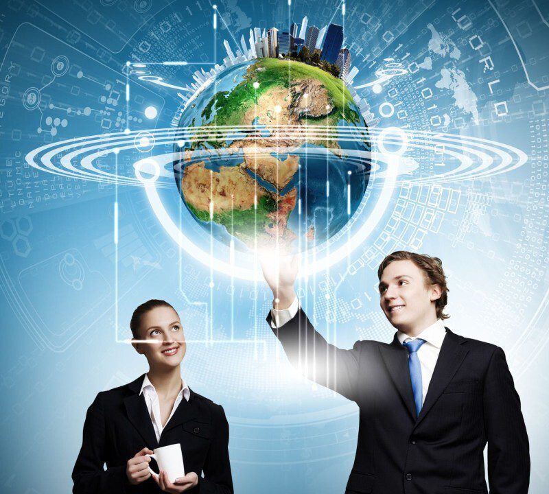 Two people in business attire interact with a digital Earth hologram surrounded by technology-themed graphics.