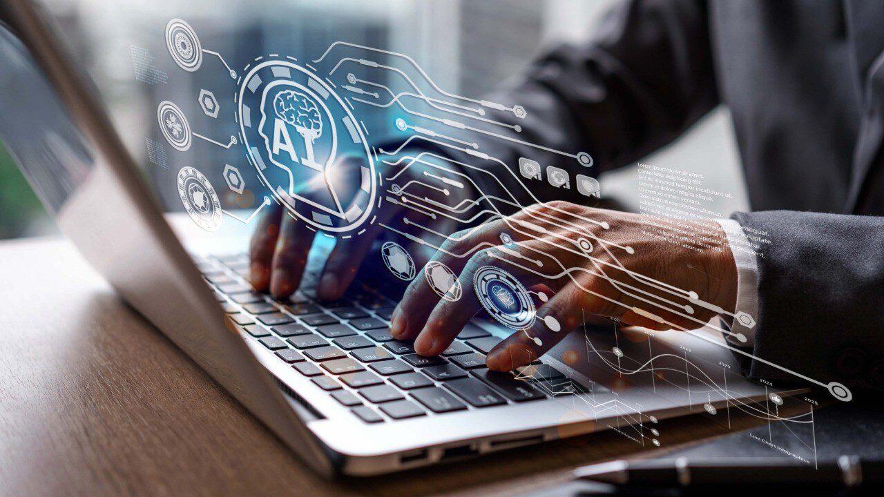 Person typing on a laptop with digital graphics of AI and technology icons overlaying the image, symbolizing artificial intelligence and data processing.