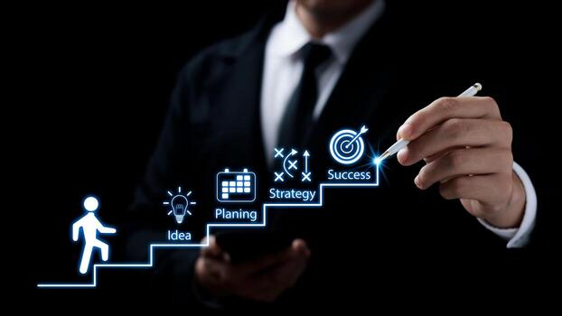 A person draws steps labeled Idea, Planing, Strategy, and Success on a transparent screen, illustrating a business growth concept.